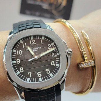 Patek Philippe Aquanaut 40mm: Stainless Steel, Black Embossed Dial & Exhibition Caseback